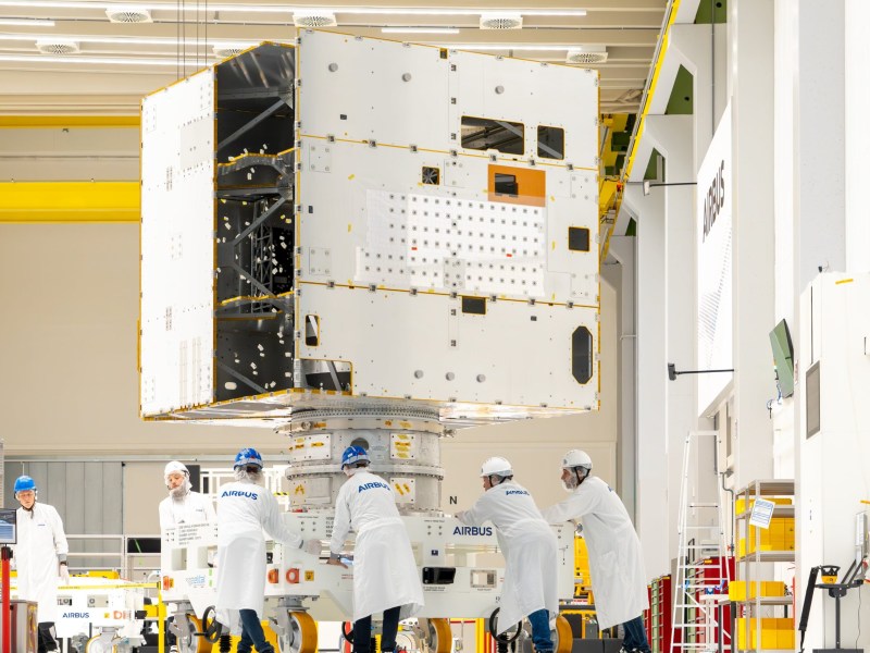 Production staff works on the Airbus Galileo G2 satellite in a manufacturing cleanroom. Credit: Airbus